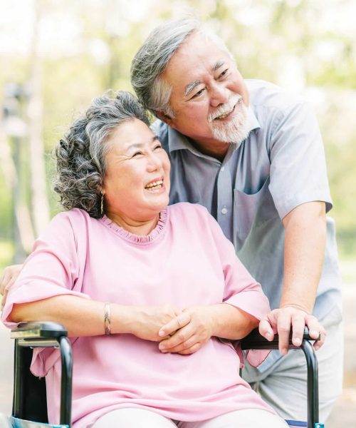 Happy,Asian,Senior,Couple,Smiling,Outside,In,The,Park,While