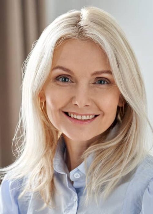 Smiling,Sophisticated,50s,Middle,Aged,Blond,Business,Woman,Looking,At Smiling,Sophisticated,50s,Middle,Aged,Blond,Business,Woman,Looking,At