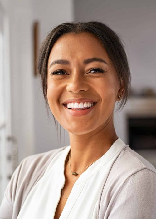 Portrait,Of,A,Beautiful,African,Woman,Smiling,While,Looking,At